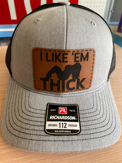 I Like 'Em Thick Leather Patch Trucker Hat
