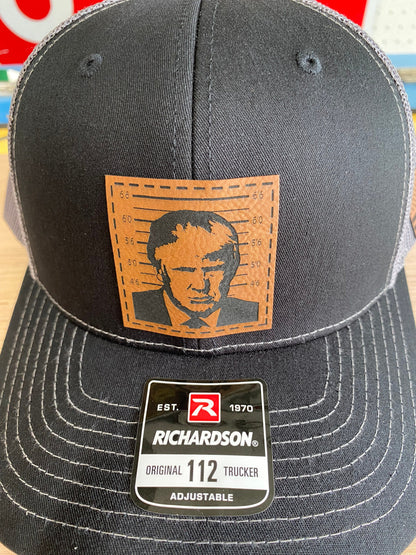 Trump 2024 Mugshot Leather Patch Trucker Hat