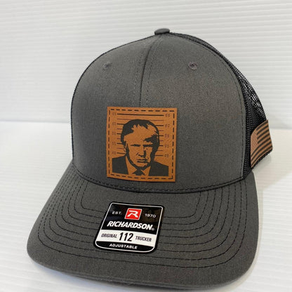 Trump 2024 Mugshot Leather Patch Trucker Hat