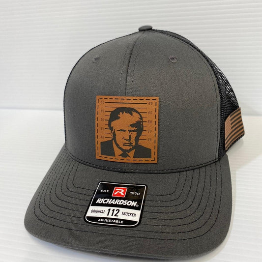 Trump 2024 Mugshot Leather Patch Trucker Hat