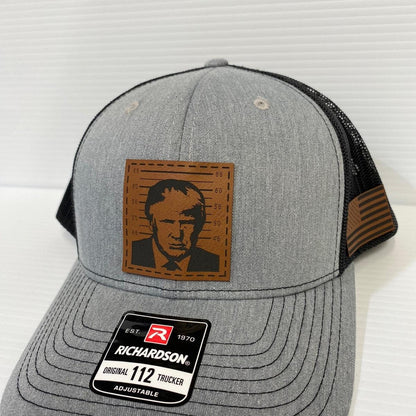 Trump 2024 Mugshot Leather Patch Trucker Hat