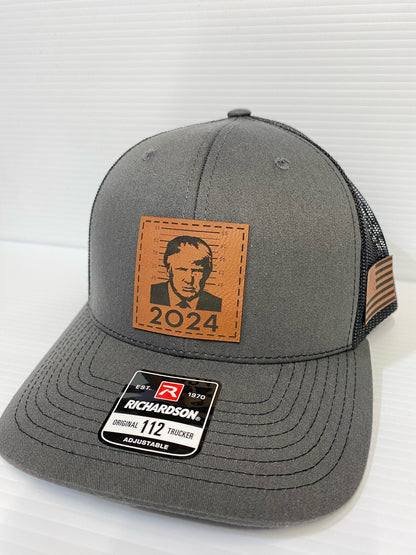 Trump 2024 Mugshot Leather Patch Richardson 112 Trucker Hat