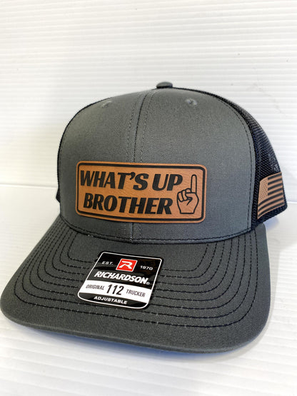 What's Up Brother Trucker Hat: Leather Patch Richardson 112
