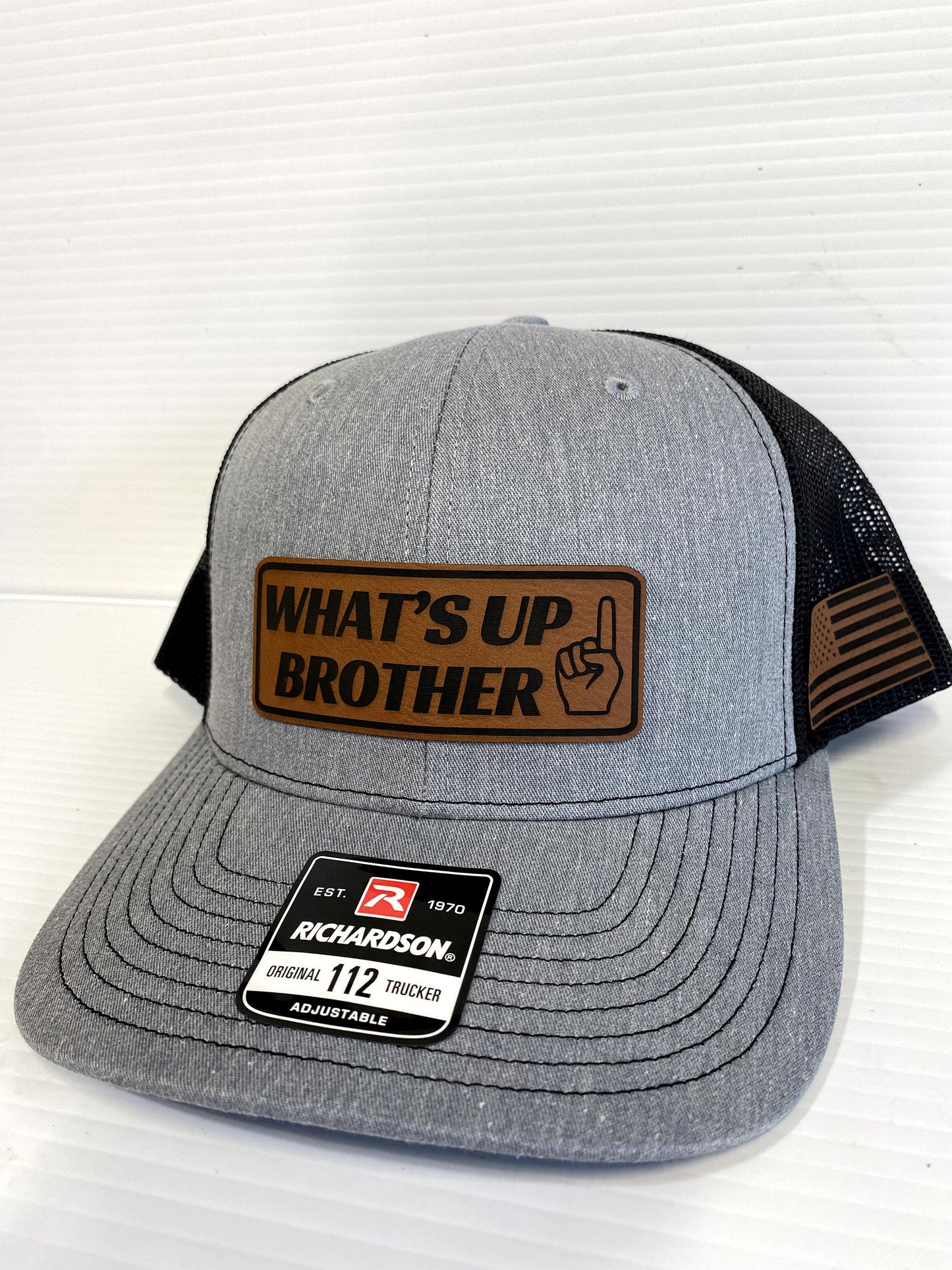 What's Up Brother Trucker Hat: Leather Patch Richardson 112