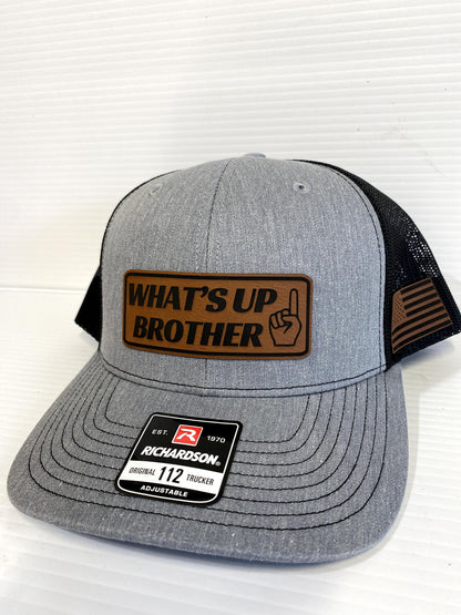 What's Up Brother Trucker Hat: Leather Patch Richardson 112