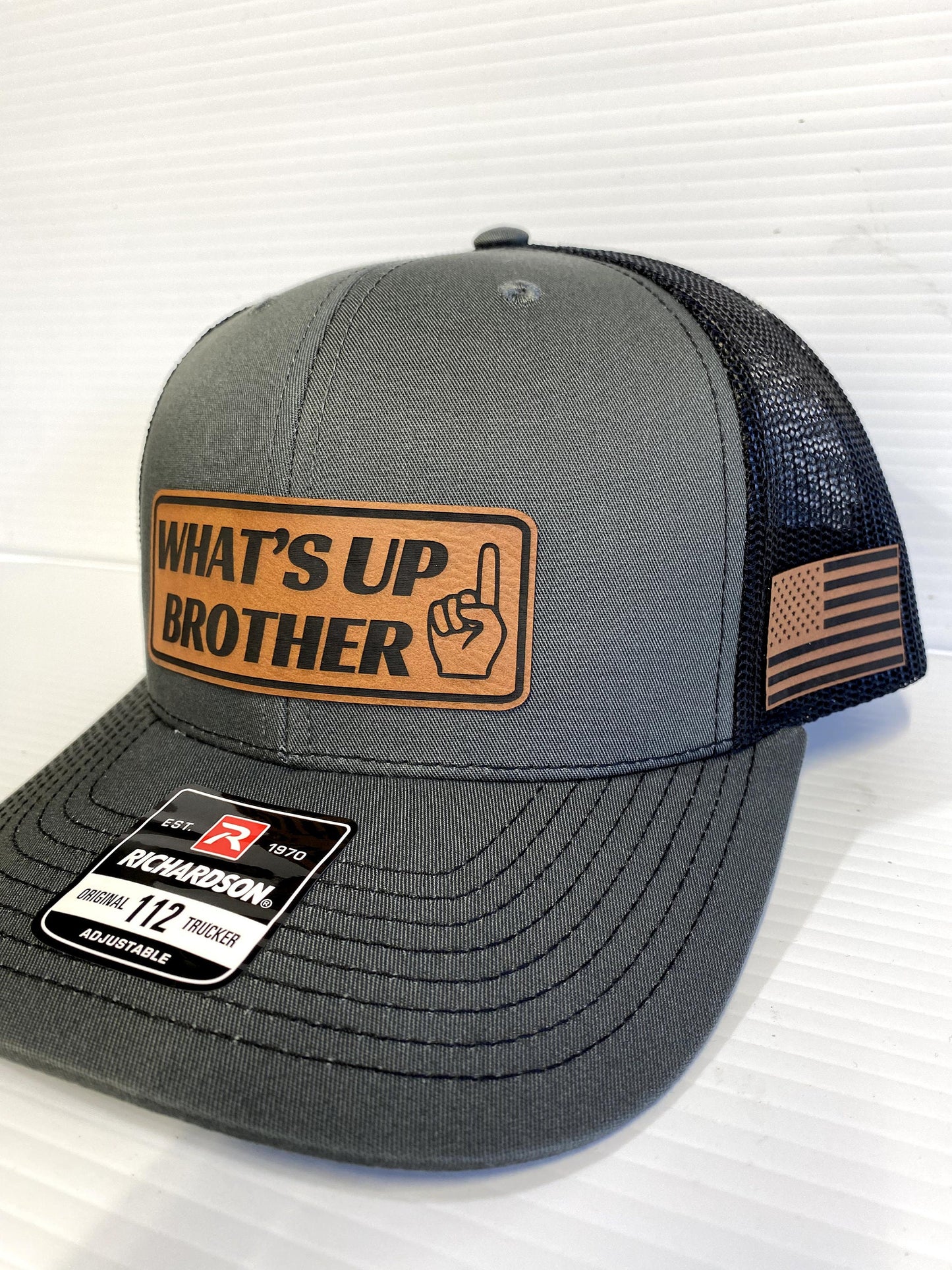 What's Up Brother Trucker Hat: Leather Patch Richardson 112