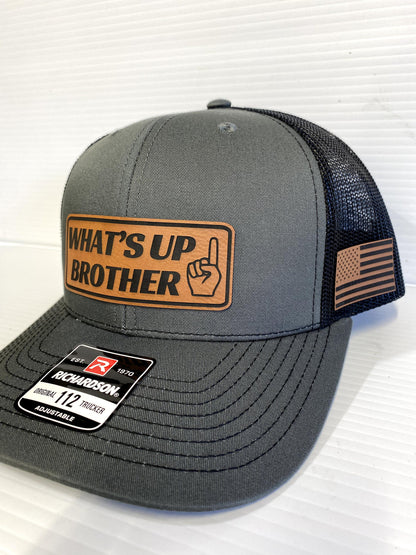 What's Up Brother Trucker Hat: Leather Patch Richardson 112
