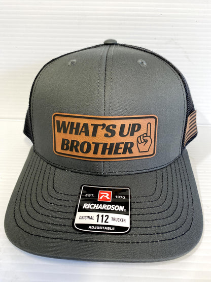 What's Up Brother Trucker Hat: Leather Patch Richardson 112